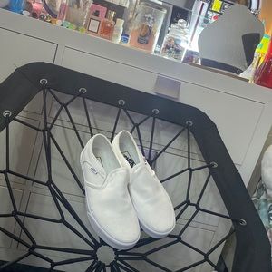 white canvas slip on vans
